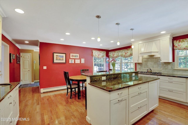 4 Briarcliff Ln, Holmdel, NJ 07733 - kitchen featuring premium range hood, a baseboard heating unit, crown molding, decorative backsplash, and recessed lighting