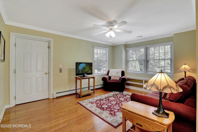 4 Briarcliff Ln, Holmdel, NJ 07733 - living area with a baseboard heating unit, light wood-style floors, ornamental molding, ceiling fan, and baseboards