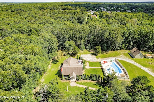 bird's eye view with a forest view
