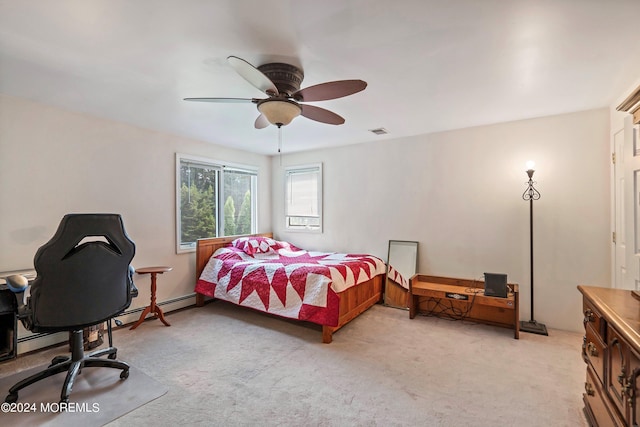 bedroom with light carpet, visible vents, and ceiling fan