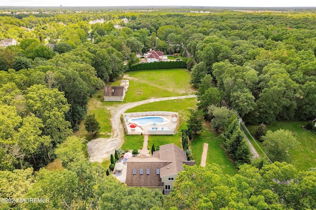 bird's eye view with a forest view