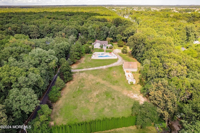bird's eye view featuring a view of trees