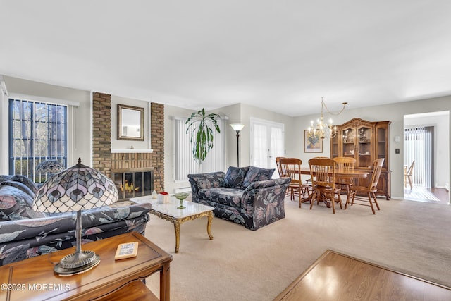 452B Heather Ct, Manchester, NJ 08759 - carpeted living area featuring a chandelier, plenty of natural light, and a fireplace