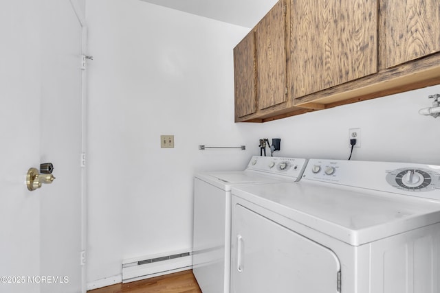 452B Heather Ct, Manchester, NJ 08759 - laundry room featuring a baseboard radiator, cabinet space, washer and clothes dryer, and light wood-style flooring