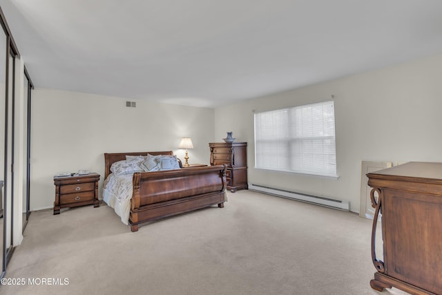 452B Heather Ct, Manchester, NJ 08759 - bedroom with visible vents, baseboard heating, and light carpet