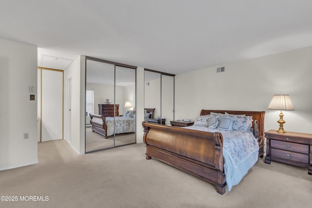 452B Heather Ct, Manchester, NJ 08759 - carpeted bedroom with two closets, baseboards, and visible vents