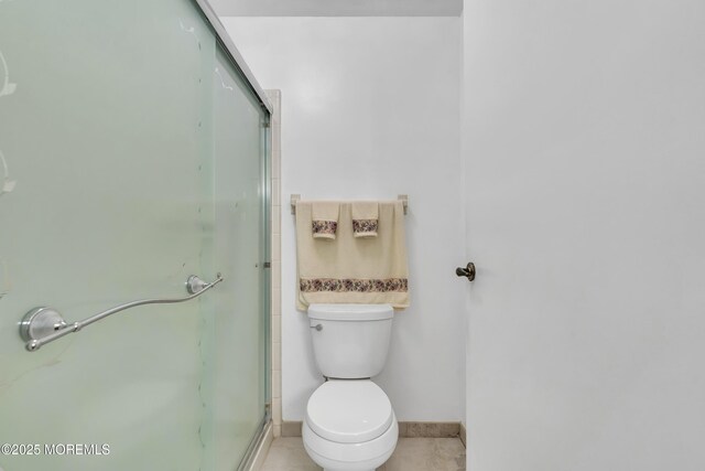 452B Heather Ct, Manchester, NJ 08759 - full bath featuring baseboards, tile patterned flooring, a shower stall, and toilet