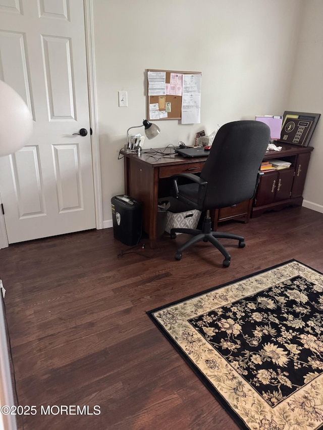 office area featuring baseboards and dark wood-style floors