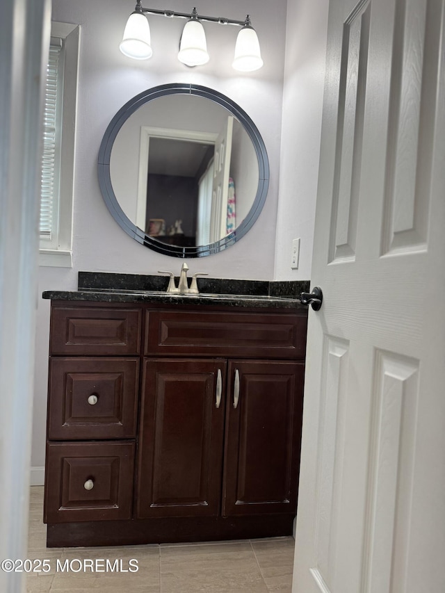bathroom featuring vanity and tile patterned floors