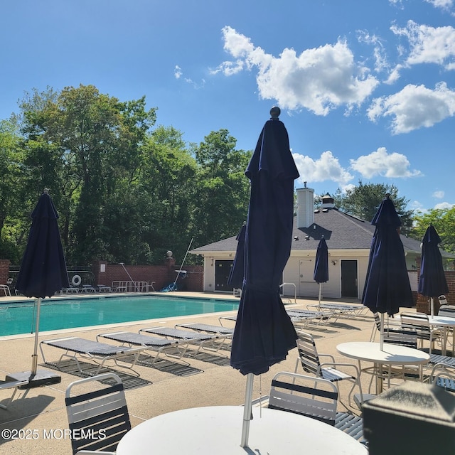 380 Daniele Dr, Ocean Twp, NJ 07712 - community pool with a patio area and fence
