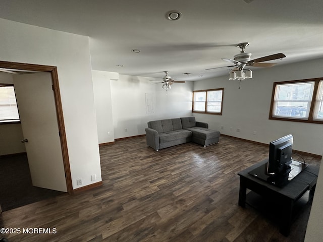 15 Cottage Pl, Keansburg, NJ 07734 - living area featuring baseboards, a ceiling fan, and dark wood-style floors