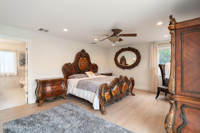 bedroom featuring visible vents, light wood-type flooring, and recessed lighting