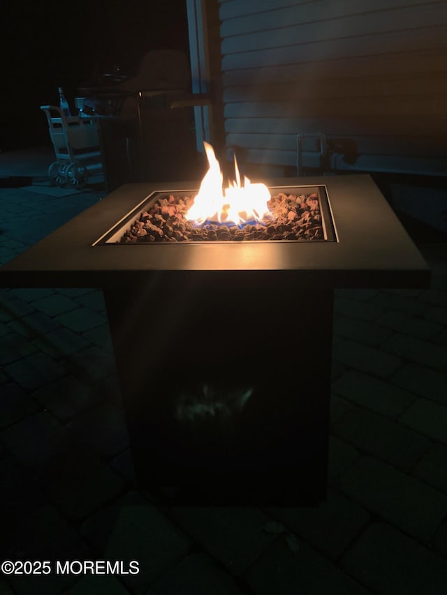 173 Sextant Rd, Manahawkin, NJ 08050 - exterior details featuring an outdoor fire pit