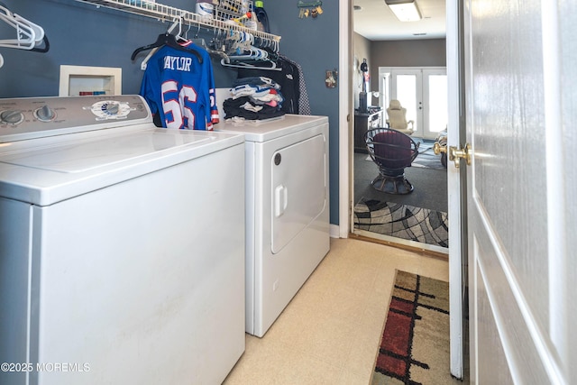 173 Sextant Rd, Manahawkin, NJ 08050 - clothes washing area with light floors, french doors, washer and clothes dryer, and laundry area