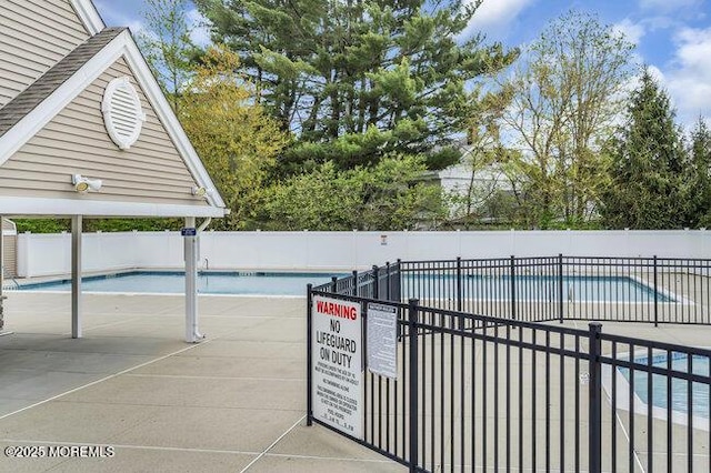 community pool with fence