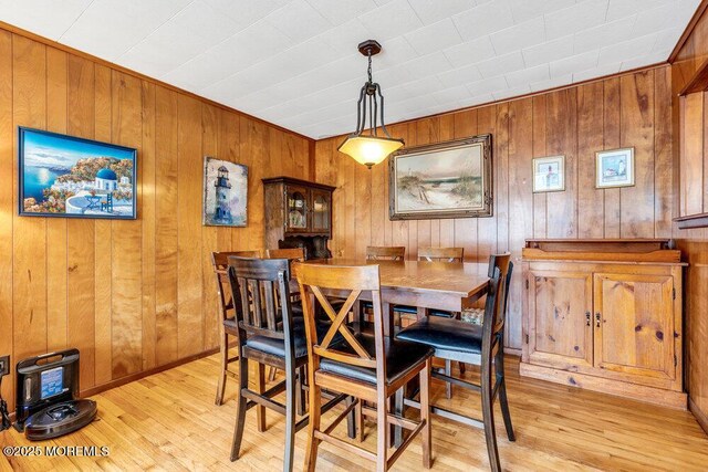 21 Dockage Rd, Bayville, NJ 08721 - dining area featuring light wood-type flooring and wooden walls