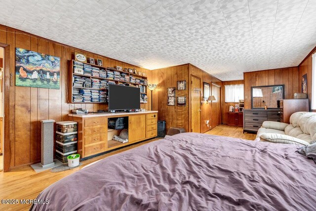 21 Dockage Rd, Bayville, NJ 08721 - bedroom with wooden walls, light wood-style flooring, and an ornate ceiling