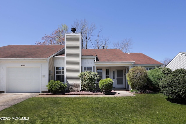 ranch-style home featuring concrete driveway, a chimney, a garage, and a front yard