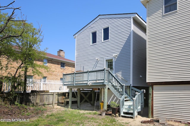 75 Gravelly Point Rd, Highlands, NJ 07732 - rear view of house with a deck, fence, and stairs