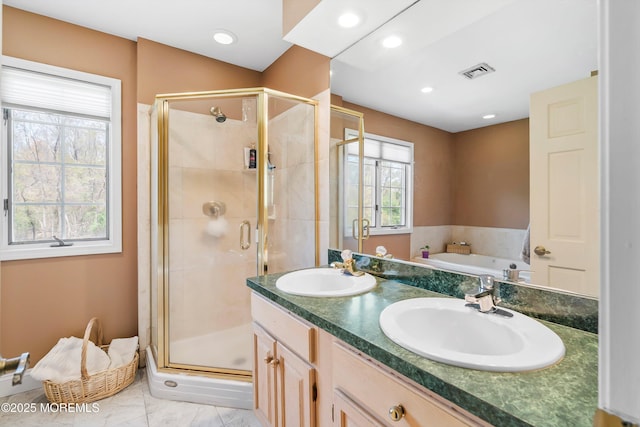 full bathroom with visible vents, a sink, and a stall shower