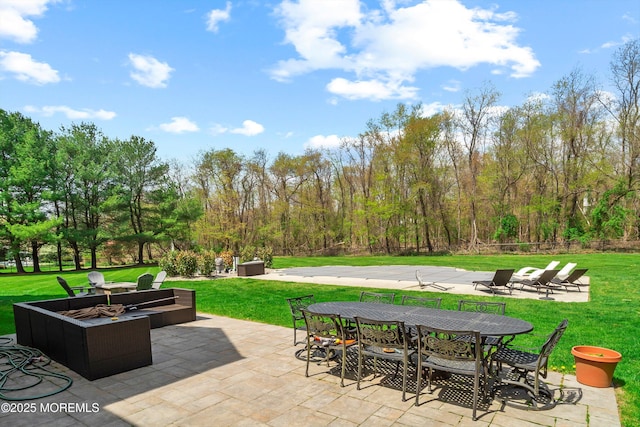 view of patio featuring outdoor dining area