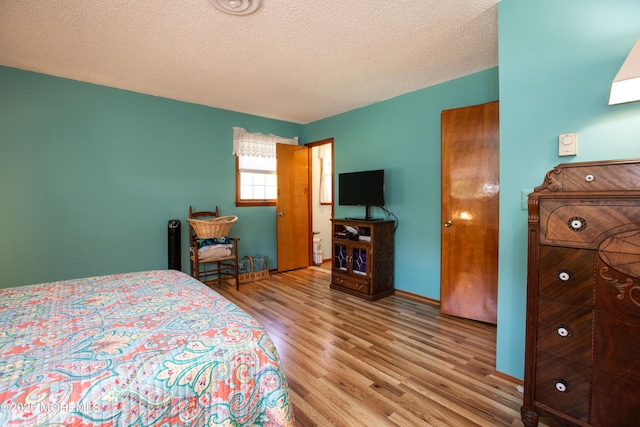 12 Millstream Rd, Cream Ridge, NJ 08514 - bedroom featuring wood finished floors and a textured ceiling