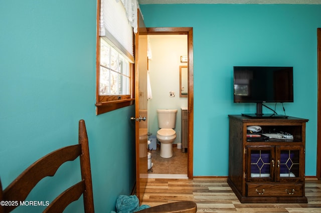 12 Millstream Rd, Cream Ridge, NJ 08514 - bathroom featuring toilet, wood finished floors, and baseboards