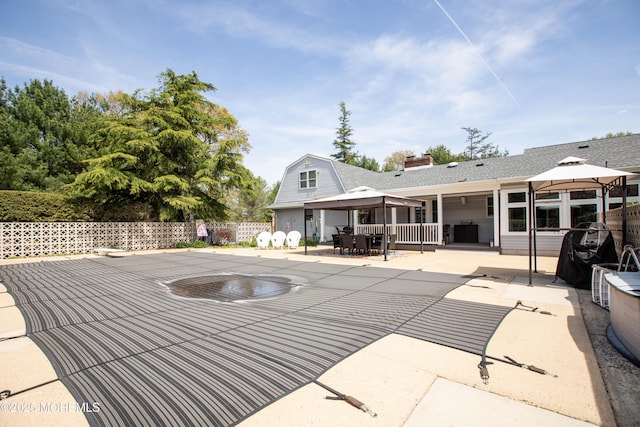 12 Millstream Rd, Cream Ridge, NJ 08514 - view of swimming pool with a gazebo, fence, outdoor dining space, and a patio area