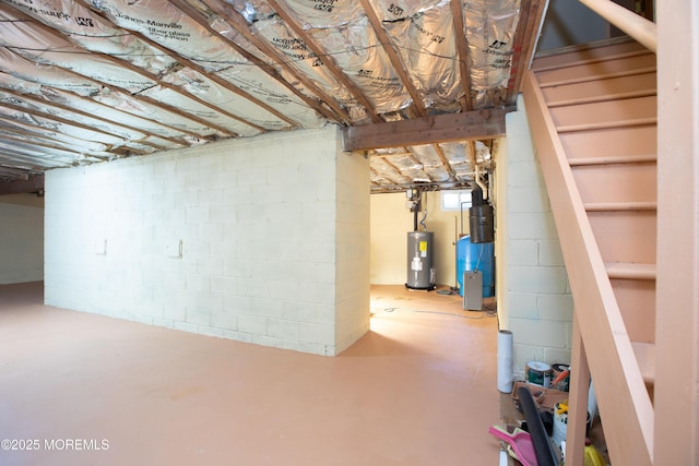 12 Millstream Rd, Cream Ridge, NJ 08514 - unfinished below grade area with water heater, stairs, and concrete block wall
