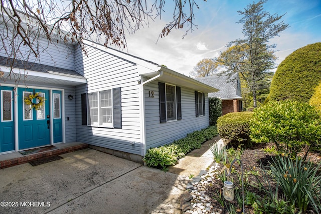 12 Millstream Rd, Cream Ridge, NJ 08514 - view of property exterior featuring roof with shingles
