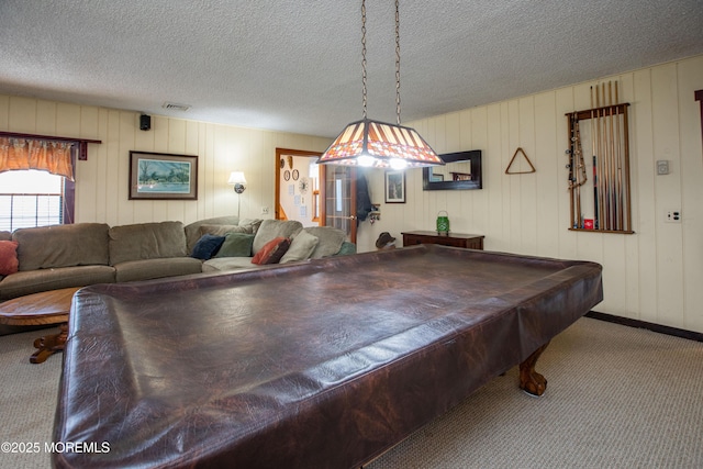 12 Millstream Rd, Cream Ridge, NJ 08514 - rec room with a textured ceiling, carpet, and visible vents
