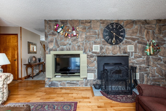 12 Millstream Rd, Cream Ridge, NJ 08514 - living area featuring baseboards, stairway, a textured ceiling, and wood finished floors