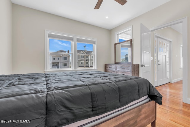 bedroom with light wood-style flooring, baseboards, recessed lighting, and ceiling fan