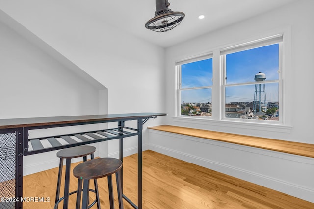 interior space with recessed lighting, light wood-style floors, and baseboards