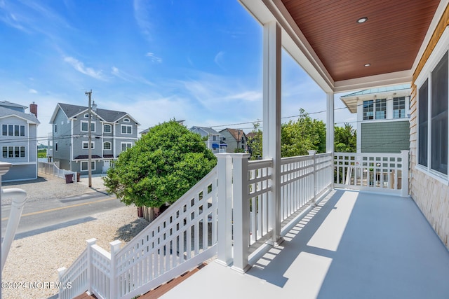 balcony featuring a residential view