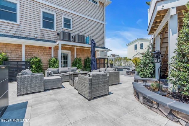 view of patio / terrace featuring cooling unit and an outdoor hangout area