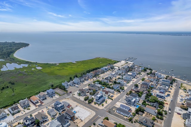 bird's eye view with a residential view and a water view