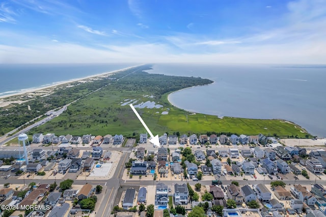 aerial view featuring a water view and a residential view
