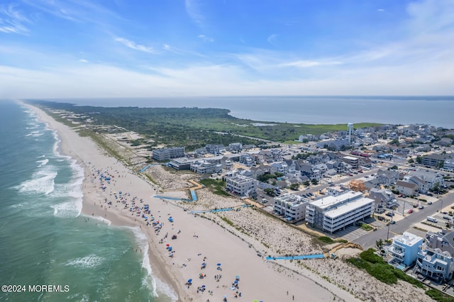 bird's eye view with a view of the beach and a water view