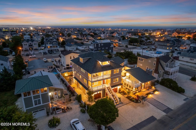 aerial view at dusk with a residential view