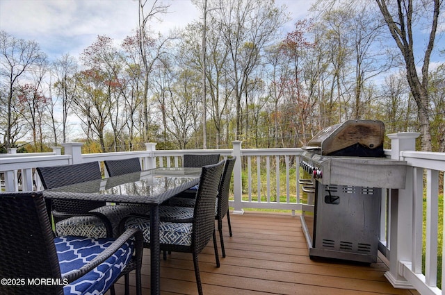 105 Pilot St, Marlboro, NJ 07746 - wooden deck with grilling area and outdoor dining space