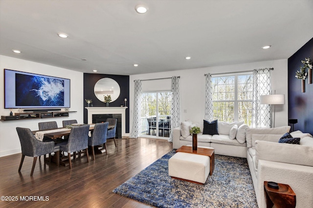 105 Pilot St, Marlboro, NJ 07746 - living area with a glass covered fireplace, wood finished floors, and recessed lighting