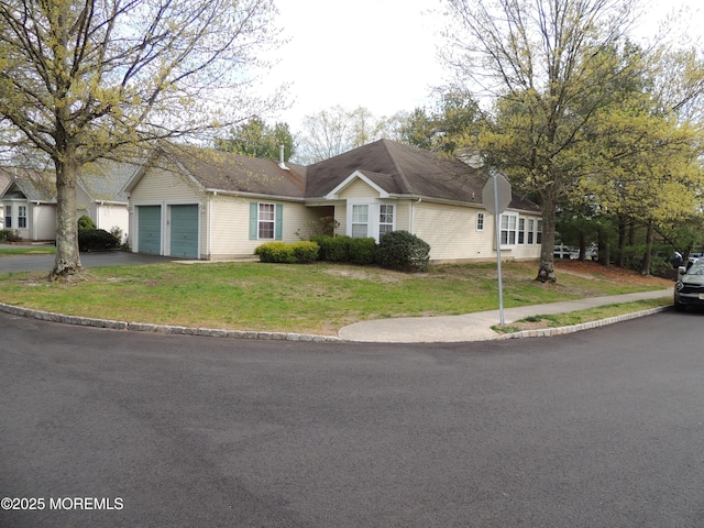 34 Meadows Ln, Manchester, NJ 08759 - ranch-style home featuring a garage, a front yard, and aphalt driveway