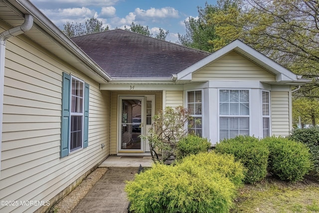 34 Meadows Ln, Manchester, NJ 08759 - view of exterior entry featuring a shingled roof