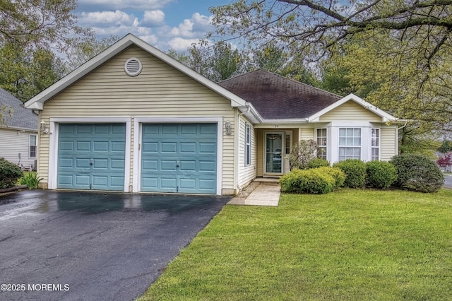 34 Meadows Ln, Manchester, NJ 08759 - view of front of house with a garage, roof with shingles, driveway, and a front yard