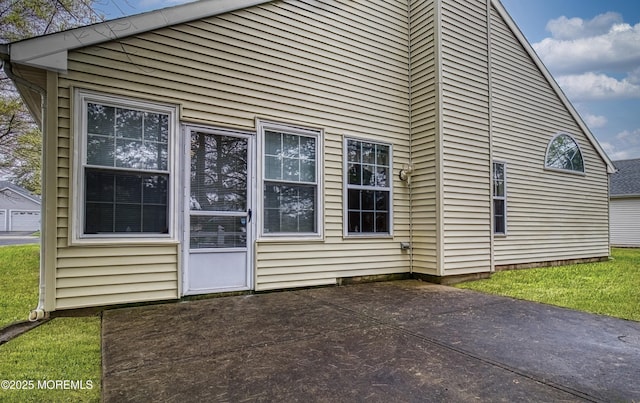 34 Meadows Ln, Manchester, NJ 08759 - view of home's exterior with a patio area