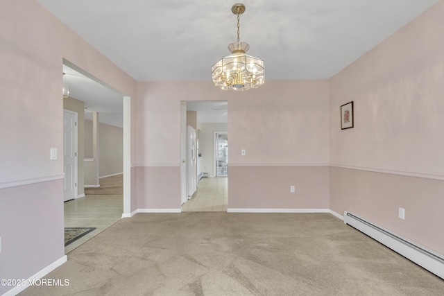 34 Meadows Ln, Manchester, NJ 08759 - spare room with carpet, a chandelier, a baseboard heating unit, and baseboards