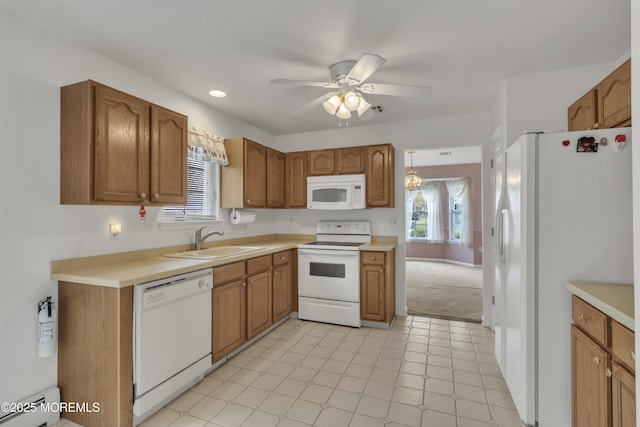 34 Meadows Ln, Manchester, NJ 08759 - kitchen featuring light countertops, a sink, ceiling fan, and white appliances