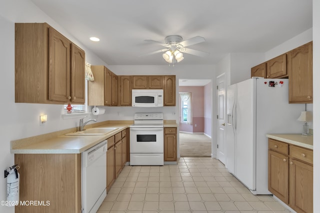 34 Meadows Ln, Manchester, NJ 08759 - kitchen featuring a sink, white appliances, a ceiling fan, light countertops, and light floors
