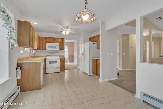 34 Meadows Ln, Manchester, NJ 08759 - kitchen with ceiling fan, white appliances, light countertops, and a baseboard heating unit